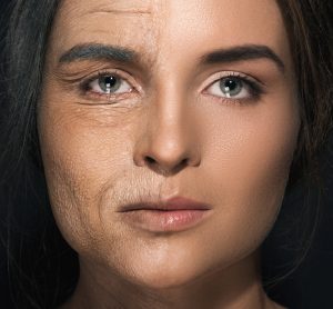 woman with half her face aged and the other youthful - idea of ageing