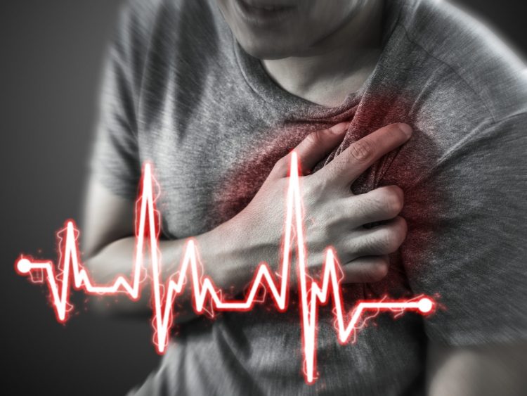 man having a heart attack, with cartoon heart rhythm overlaid